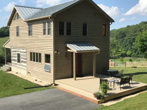 Spacious and sunny back deck for reading and relaxing.