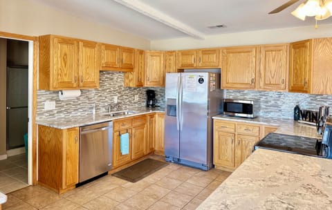 Kitchen: microwave, 12-cup drip coffee pot, and everything you need to feed :-)