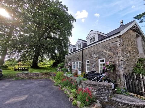 Charming stone cottage with flower-filled garden