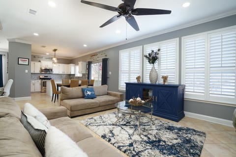 Living and entertaining room area with large natural lighting