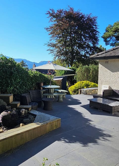 Main patio is a sun trap in late afternoon, plenty of seating options
