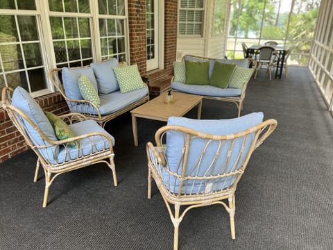 Screened In Porch on the back of the house and overlooks the lake.