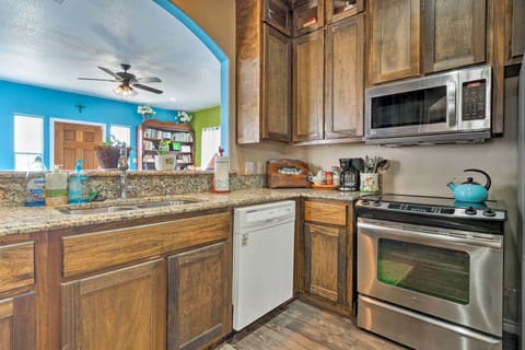 Cook with ease in the fully equipped kitchen.