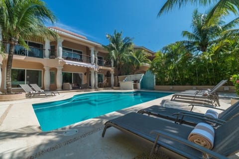 Sarita, with lush vegetation, palm trees and coconut trees