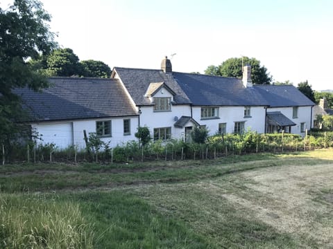 The cottage on the left which sits on a bridle path directly to the moor