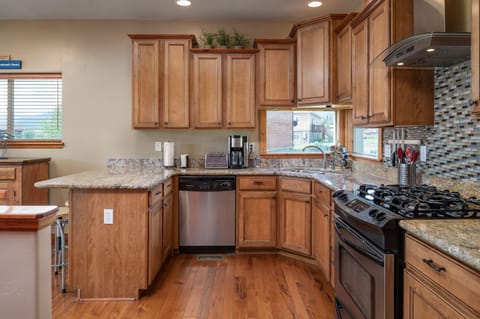 Stainless steel appliances with under cabinet lighting