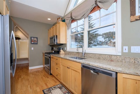 Another view of kitchen with large pantry, perfect for large groups/families.