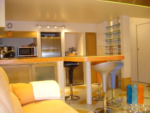 This stylish apartment is great for networking!  Check out the wine glasses!