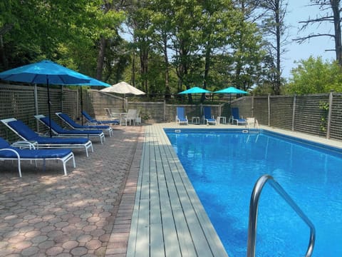 Beautiful pool area with inviting outdoor loungers.