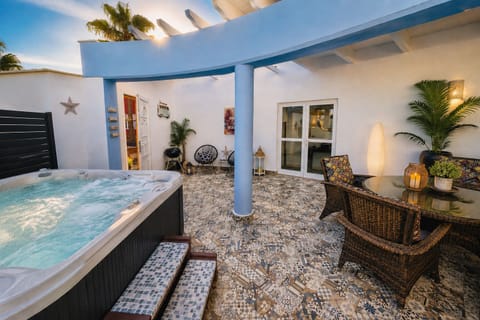 Your outdoor courtyard with amazing hot tub.