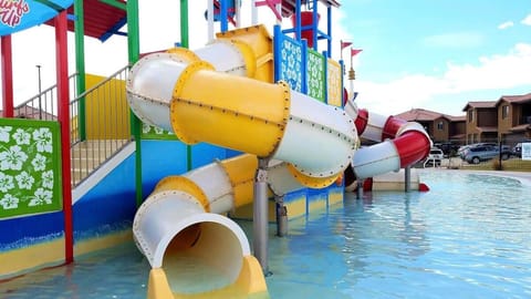 Across the street from private water park with multiple slides
