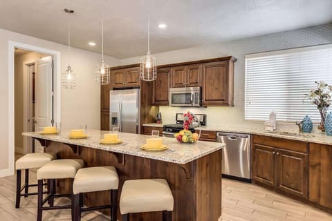 Large kitchen island seats additional four people