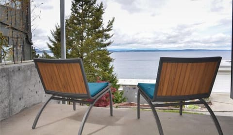 Enjoy the expansive unobstructed ocean and mountain views from your private deck