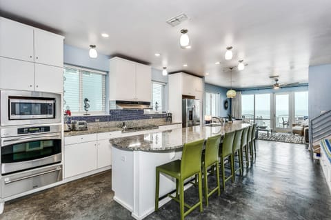 Kitchen with large bar