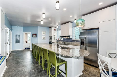 Kitchen with large bar