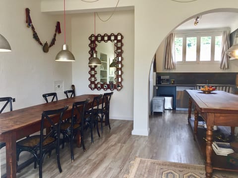 The Kitchen & dining  area with its unique wooden table from the Hermes factory