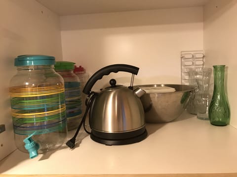 Large mixing bowl, sun tea jars and teapot