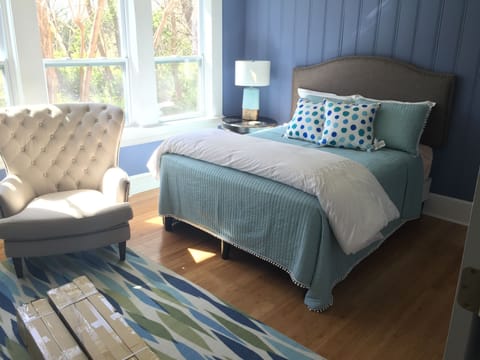 Large , spacious and comfortable bedroom. Hardwood floors, lots of windows, 