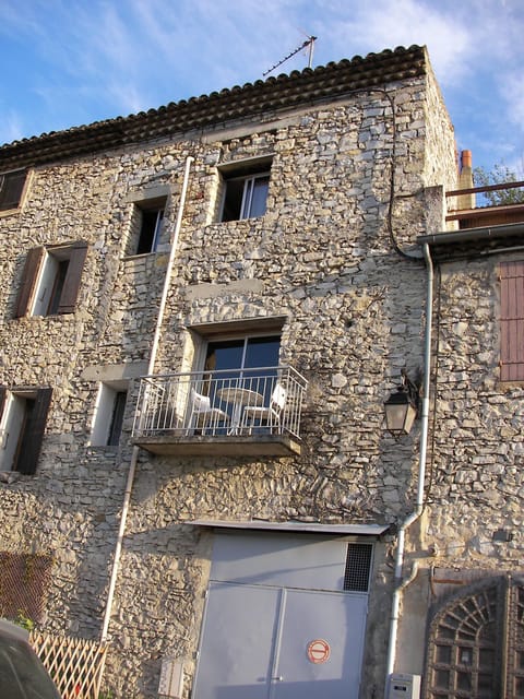 Skinny house on 4 levels, from garage at bottom to solarium behind roof.