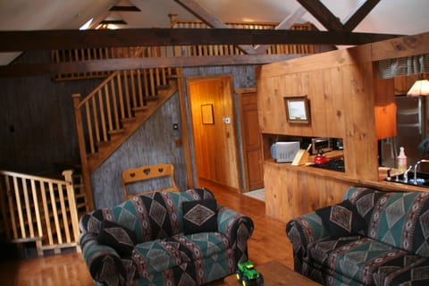 living room view to 2nd floor loft area