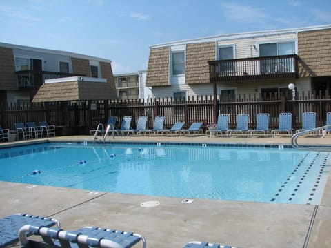 Pool View.  The apartment is on the ground level; right side under balcony.