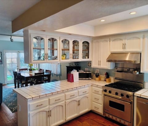 Plenty of food prep area in well lit kitchen as well as natural light