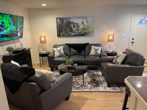 You will enter into a cozy living room, smart TV with cable, new furnishings