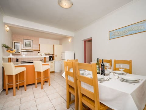 Room, Property, Furniture, Building, Real Estate, Yellow, Interior Design, Dining Room, Table, House