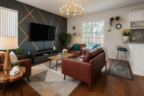 A second living room area, Xbox, Wii games, Apple TV, and a smart TV.