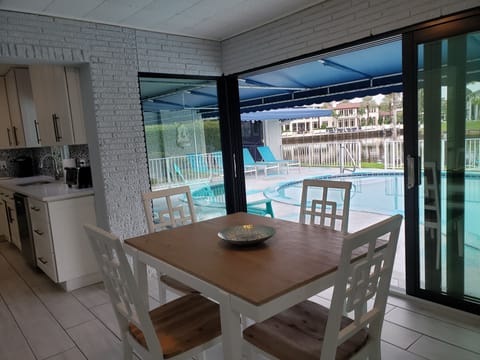 Open breakfast area with panoramic glass views