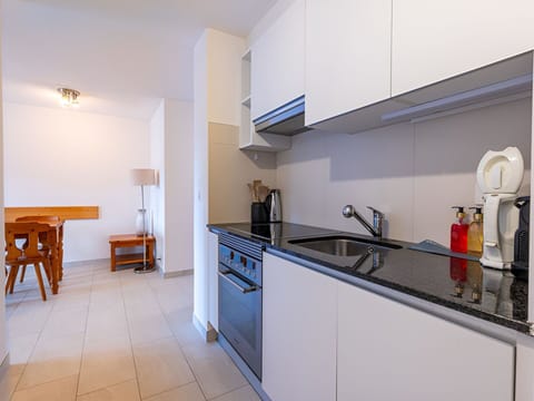 Kitchen, Countertop, Flooring, Interior Design, Floor, Wood, Kitchen Appliance, Major Appliance, Furniture, Cabinetry