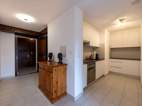 Interior Design, Flooring, Floor, Wood, Ceiling, Countertop, Cabinetry, Room, Furniture, Kitchen