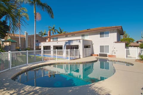 - Backyard with private pool and fenced area for safe family fun   - Spacious outdoor retreat perfect for swimming and relaxation   - Sunny vacation home designed for comfort and group gatherings