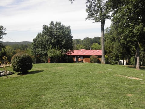 Roadside of house from turnaround at the street.