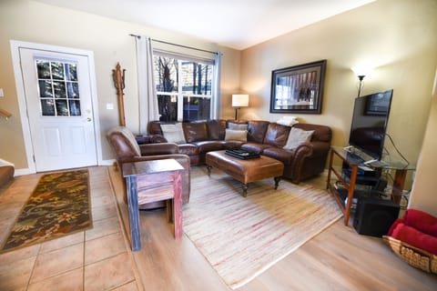 Living Room Area - Living room with a flat screen TV and fireplace.