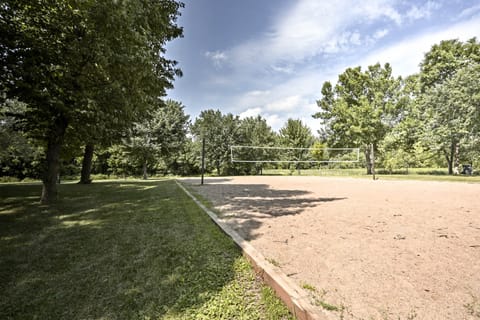 Play some sand volleyball with friends and family.