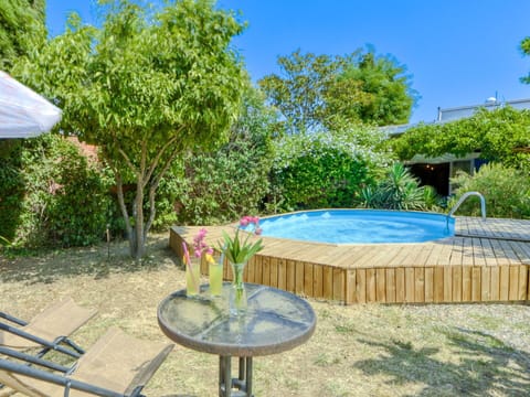 Plant, Property, Plant Community, Furniture, Table, Sky, Botany, Nature, Azure, Outdoor Furniture