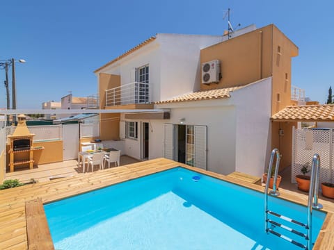 Building, Property, Sky, Window, Swimming Pool, Water, Azure, Shade, House, Lighting