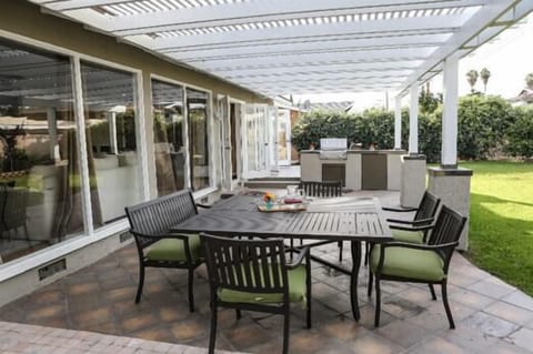 Spacious Outdoor Patio Dining with Built-in Grill