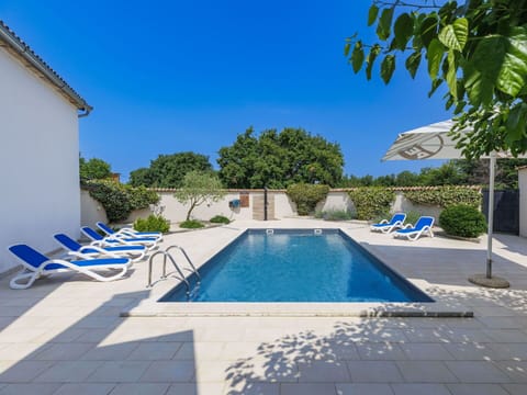 Blue, Swimming Pool, Outdoor Furniture, Composite Material, Resort, Sunlounger, Shade, Chair, Flagstone, Water Feature
