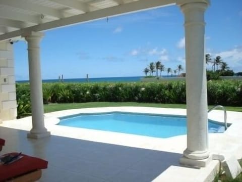 View of the pool & sea from the breezy back patio