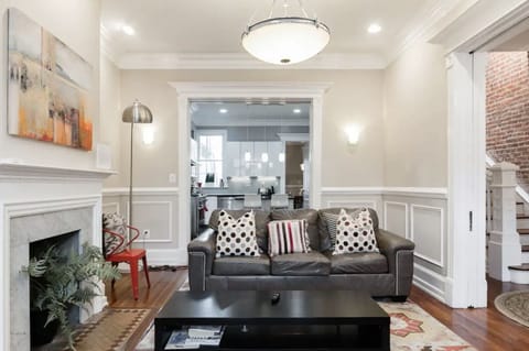 first floor tv room with sofa and coffee table