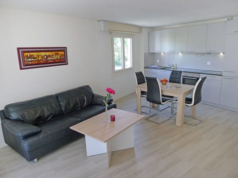 Furniture, Room, Property, Living Room, Floor, Coffee Table, Table, Interior Design, Laminate Flooring, Building