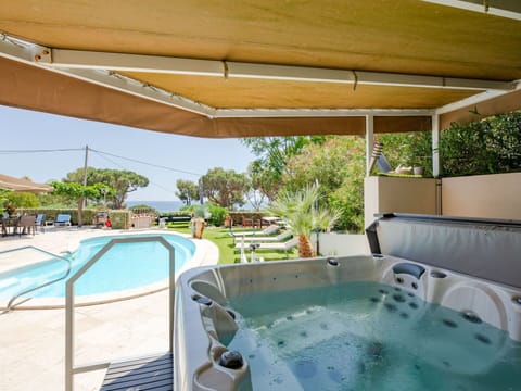 Water, Property, Swimming Pool, Azure, Shade, Plant, Building, Outdoor Furniture, Leisure, Composite Material