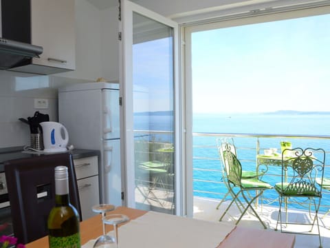 Property, Sky, Building, Furniture, Window, Shade, Kitchen Appliance, Interior Design, Bottle, Chair