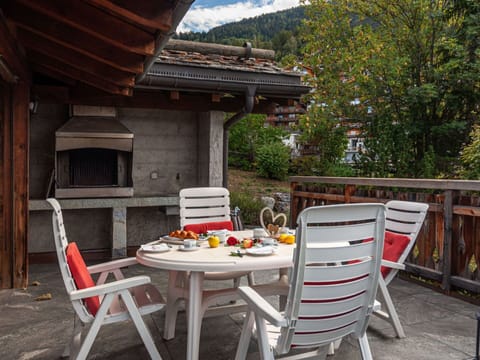 Furniture, Property, Table, Plant, Chair, Building, Outdoor Table, Outdoor Furniture, Wood, Tree