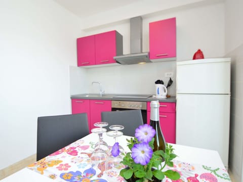 Building, Property, Furniture, Cabinetry, Table, Flower, Chair, Interior Design, House, Pink