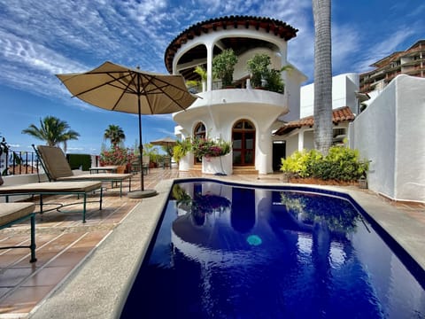 Our jewel-box style villa is located steps from the Conchas Chinas Beach!