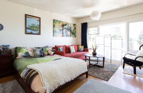 Bright and sunny bedroom/living room with beautiful bay views!