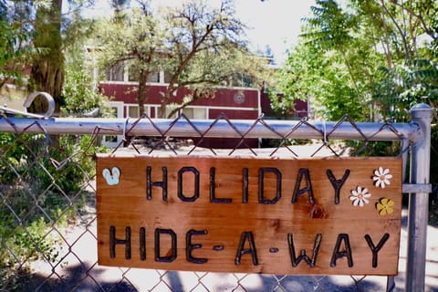 Look for the welcoming sign on the gate to the driveway. 